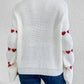 pull femme détail cœur sur manche